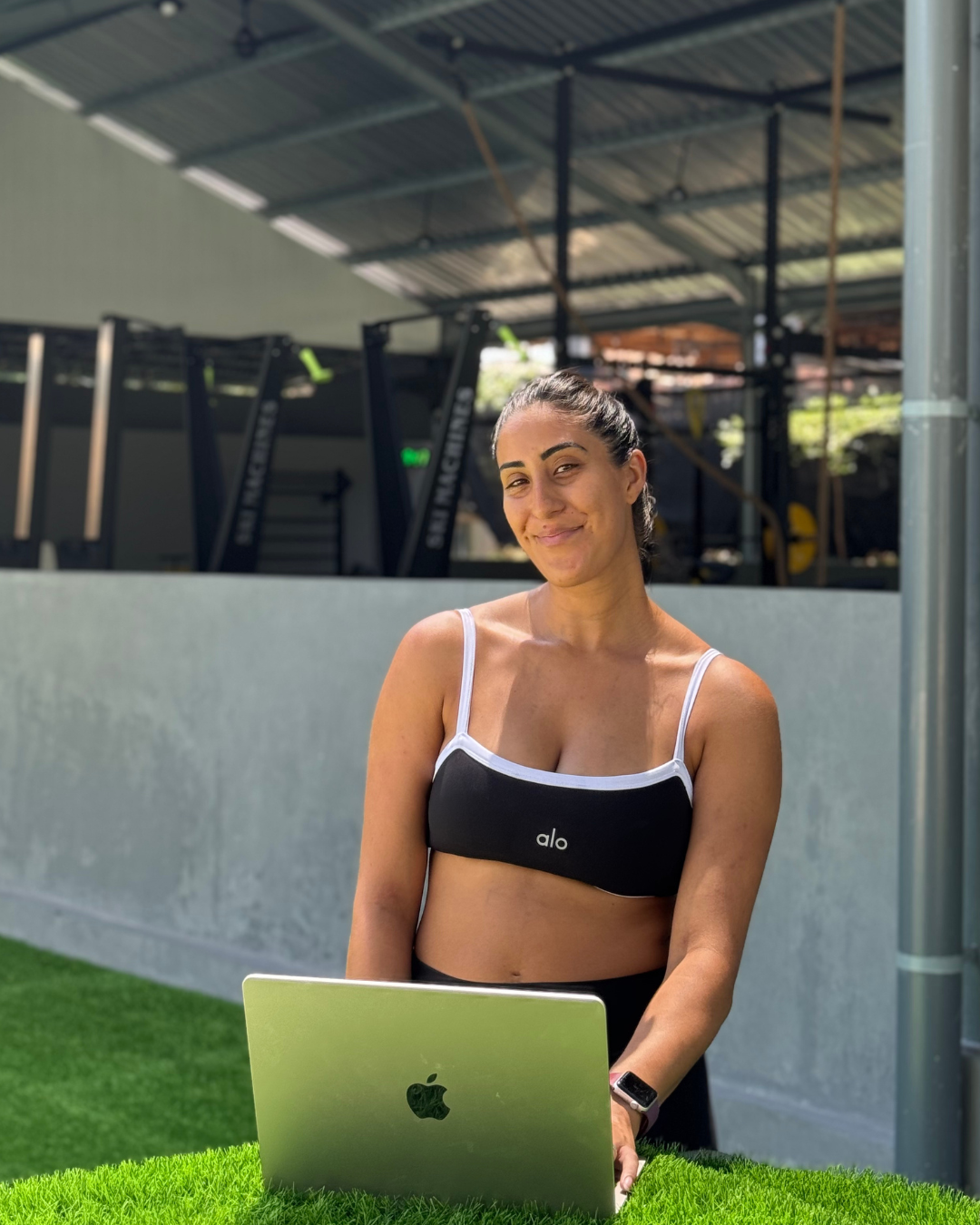 Chanel, MotherStrong coach, working at an outdoor gym